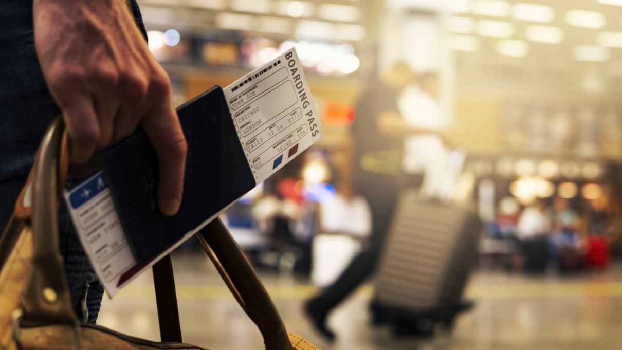 Passport in hand in airport